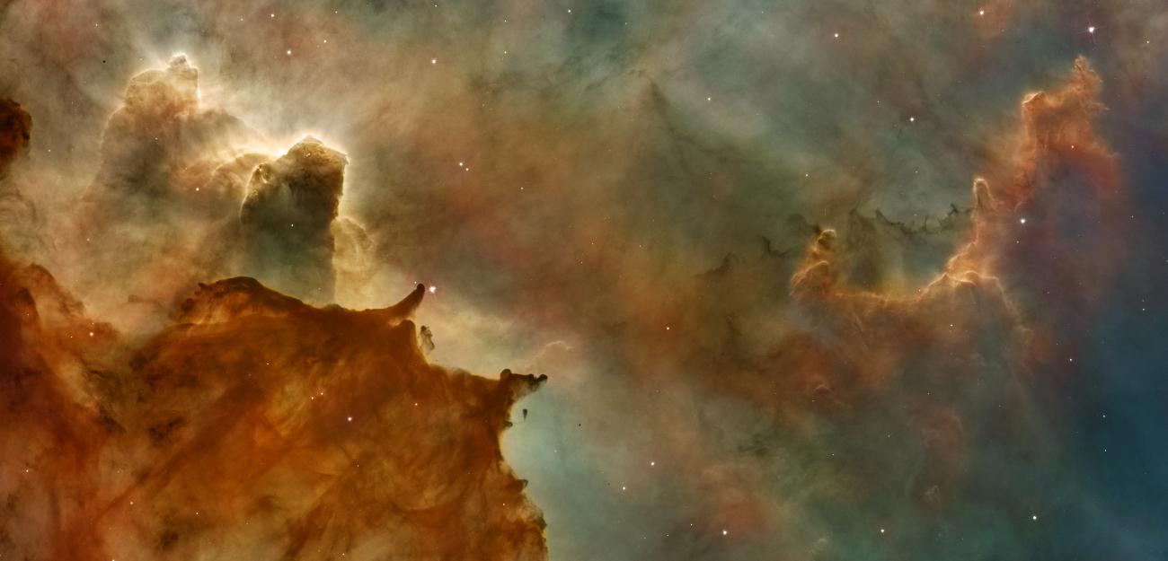 A swirl of colors and gaseous clouds in a nebula