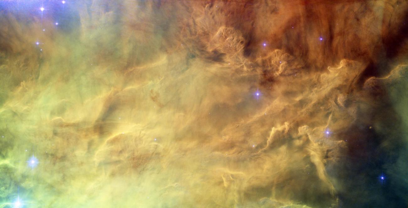 New stars glimmer in the clouds of this nebula