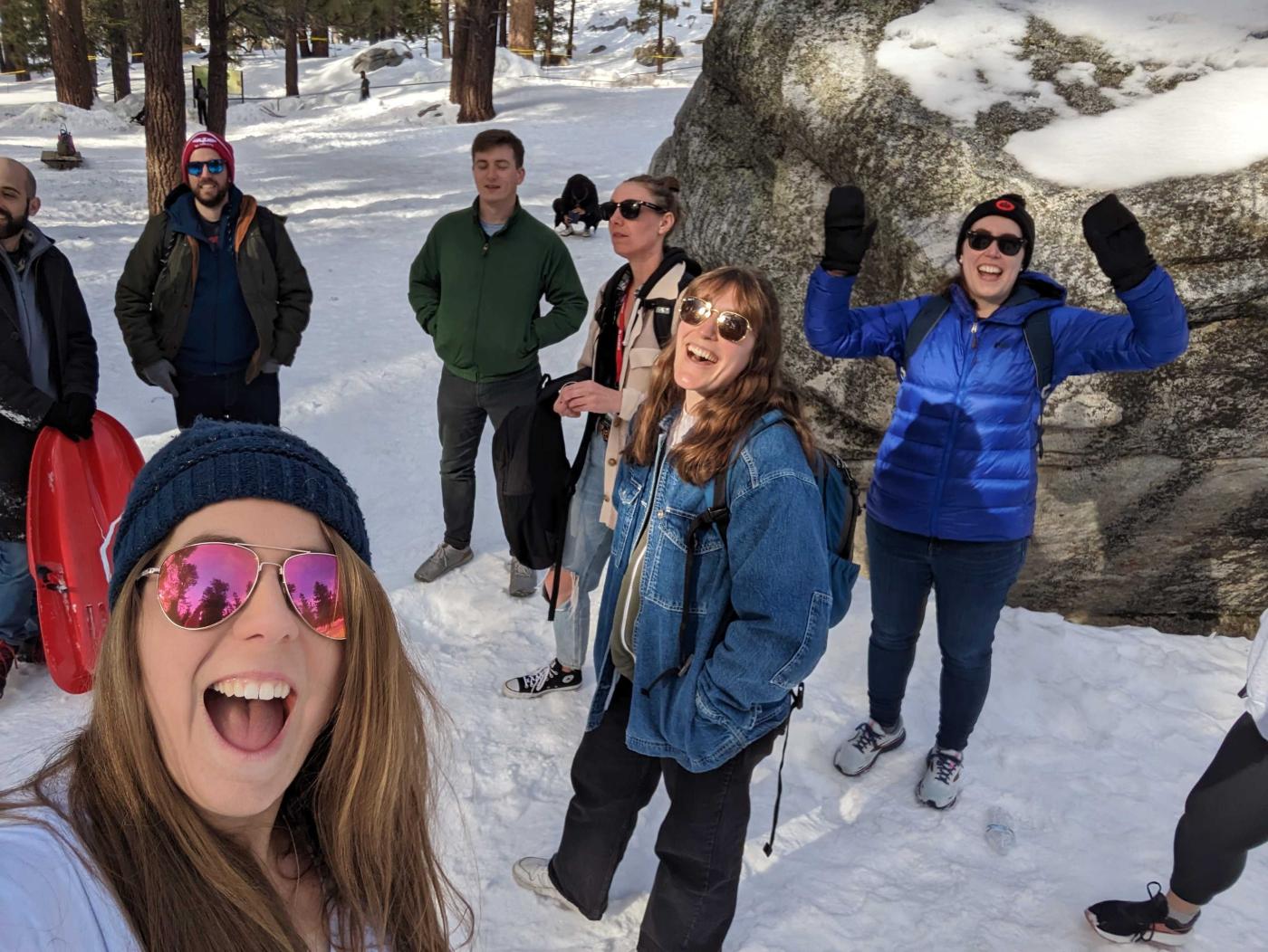 Lullabot team members standing in the snow on a mountain in Palm Springs.