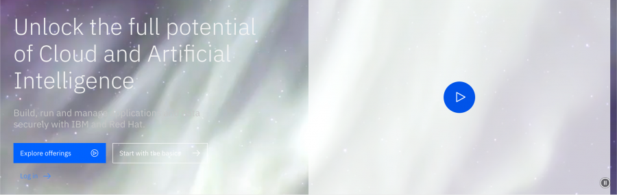 Screenshot of web page section featuring a video background with text, a large link, and a small play/pause button