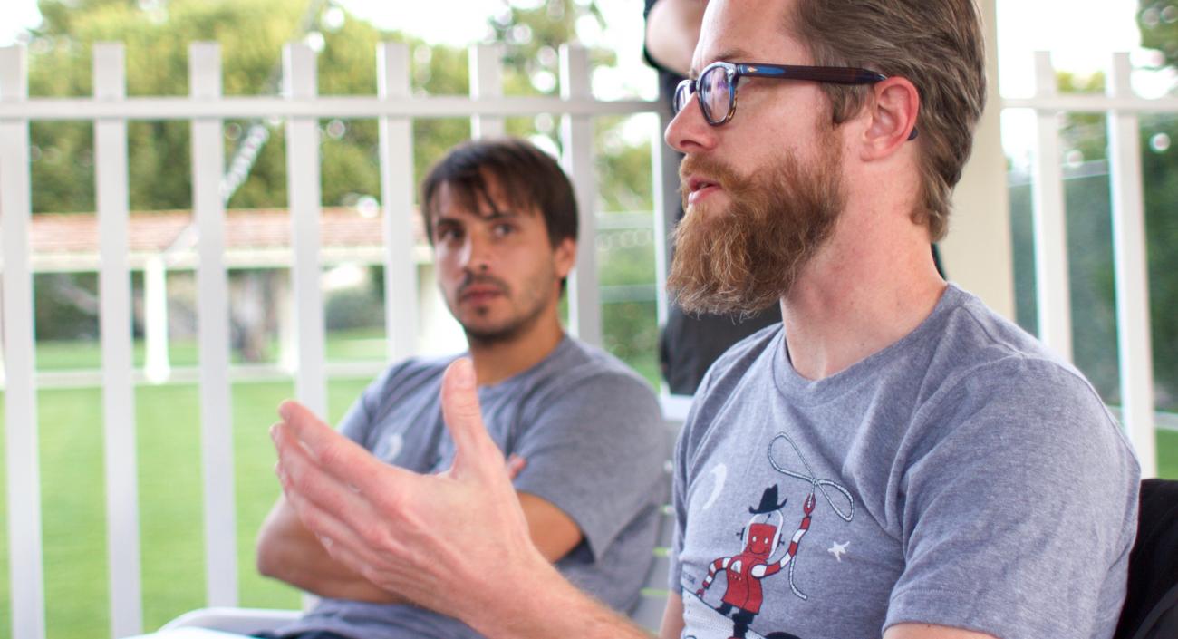 Lullabots having a discussion on a patio.