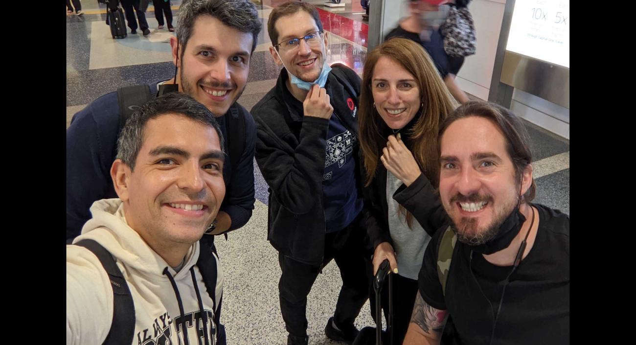 Lullabot team members posing for a group shot at the airport.