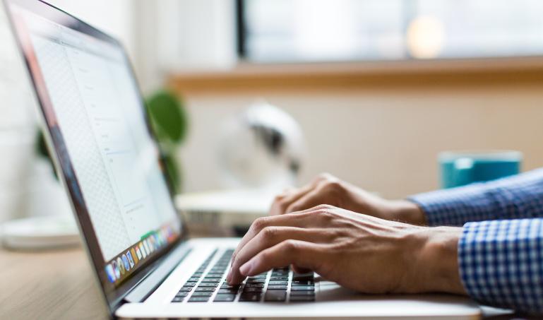typing on a laptop