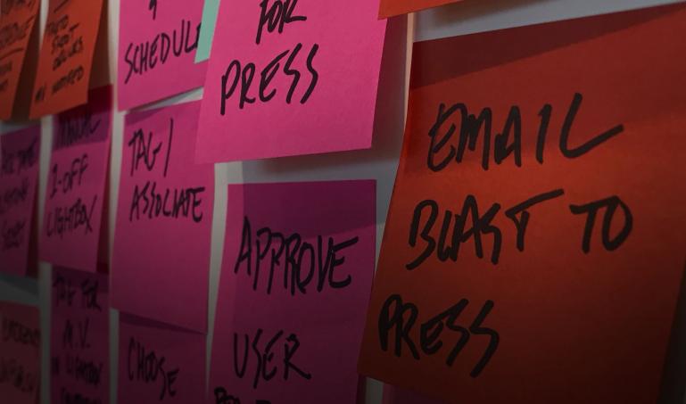 Post-it notes on the wall, all with text on them