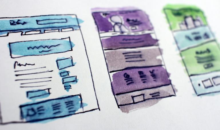 Website layouts drawn and colored on a page